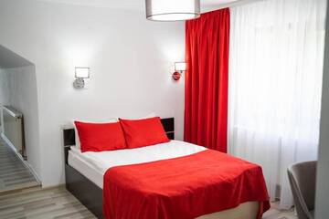 Фото номера Люкс с балконом и видом на горы Отель Piscul Negru Hotel - Transfagarasan г. Cumpăna 10